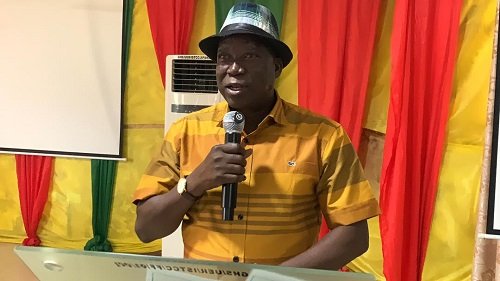 ---Mr Akamugri (inset) addressing participants at the meeting in Bolgatanga