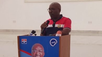 Mr Woanya (inset) speaking at the programme