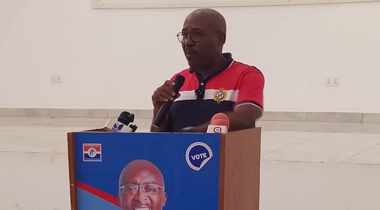Mr Woanya (inset) speaking at the programme