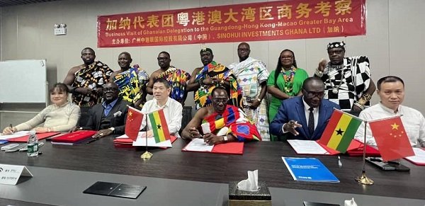 Togbe Hodo (fourth from left) with Mr Bonsu, the Chinese officials and the delegation from the Volta Regional House of Chiefs after signing the MOU