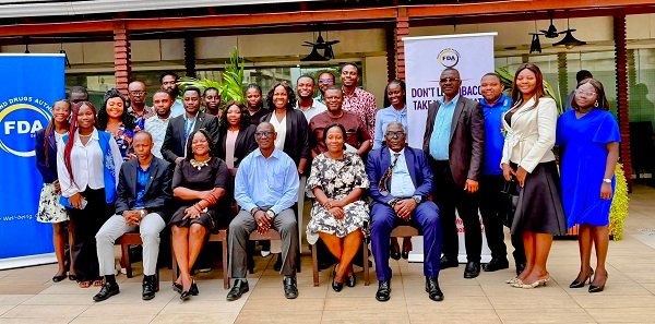Officials of FDA and participants after the workshop