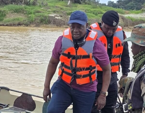 We will not waver in galamsey fight -------Mr Armah-Kofi Buah (infront) with military personnel during an operation against illegal mining sites on the Ankobra River in the Western Region