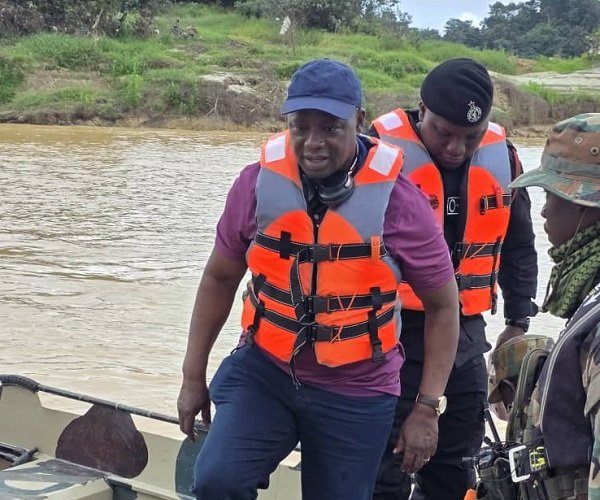 We will not waver in galamsey fight -------Mr Armah-Kofi Buah (infront) with military personnel during an operation against illegal mining sites on the Ankobra River in the Western Region