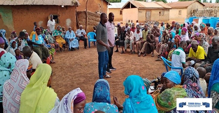 Dr Kwabahson, the Acting Manager of GII at a field engagement with farmers.