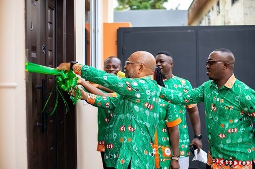 Rev. Bhakta (left) and other dignitaries cutting the tape to officially open the facility
