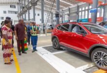 President Mahama (second from left) and Mrs Ofosu-Adjare (left) being briefed at the Zonda Tec Ghana vehicle assembly facility in Tema