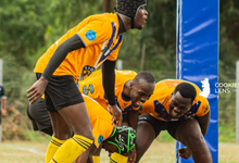 Titans' Papa Sakyi Baidoo (with ball) scores a Try whiles being flanked by teammates