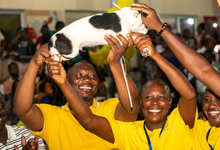• Mr Bernard Mornah (left), captain of the Dagaaba, displaying the puppy trophy after the event