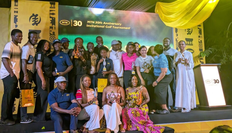 • Mr Ishmael Yamson (arrowed) with winners and officials after the presentation ceremony