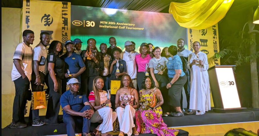 • Mr Ishmael Yamson (arrowed) with winners and officials after the presentation ceremony
