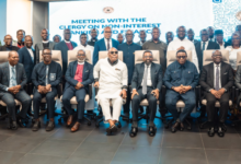 Dr Asiama (seated fifth from left), with Mr Elvis Afriyie Ankrah (seated fifth from right) and other representatives of the various religious groups after the event