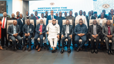 Dr Asiama (seated fifth from left), with Mr Elvis Afriyie Ankrah (seated fifth from right) and other representatives of the various religious groups after the event
