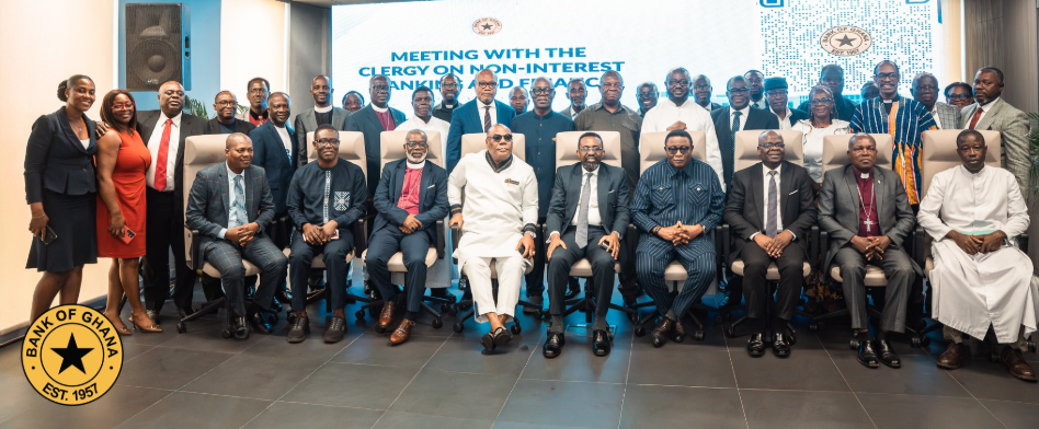 Dr Asiama (seated fifth from left), with Mr Elvis Afriyie Ankrah (seated fifth from right) and other representatives of the various religious groups after the event