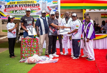 The GTF Executive led by Mr Lartey Otu presenting uniforms to the Ashanti regional chairman, Mr Simon Gluikpor during the launch