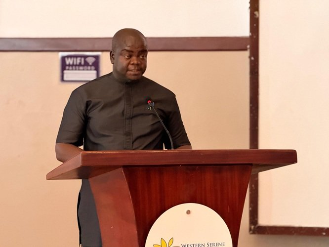 Dr Bako (inset) addressing the participants at the event