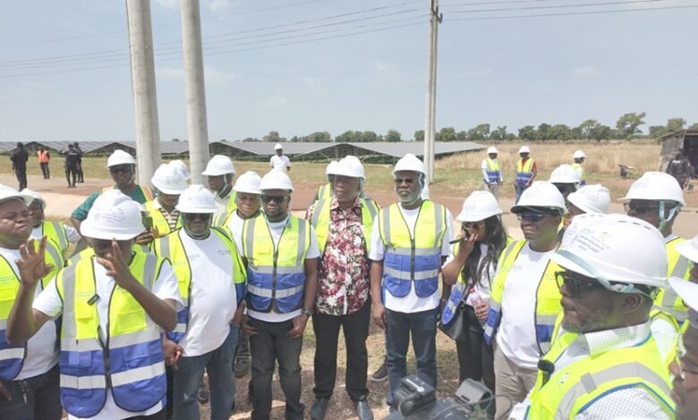 Some members of Parliament’s Select Committee on Energy and Mines at the project site.