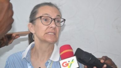 Prof. Jennifer Clarke (inset) speaking at the symposium Photo Victor A. Buxton