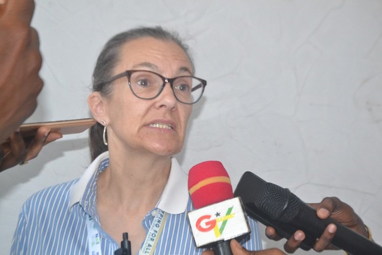 Prof. Jennifer Clarke (inset) speaking at the symposium Photo Victor A. Buxton