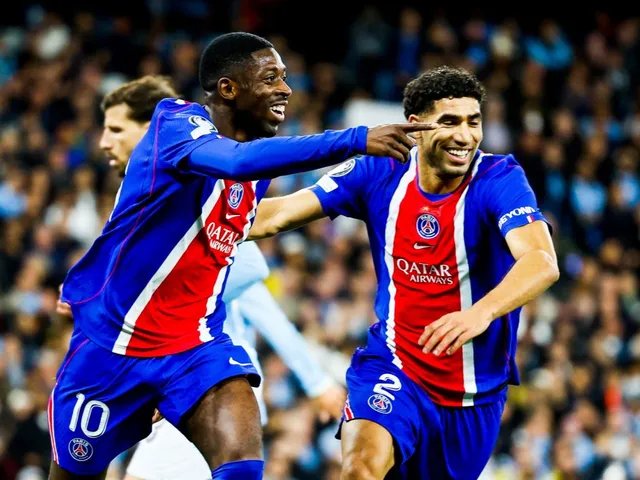 Achraf Hakimi (right) joins Ousmane Dembélé to celebrate the second goal