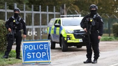 Armed police maintain roadblocks and security checks around RAF Fairford in England