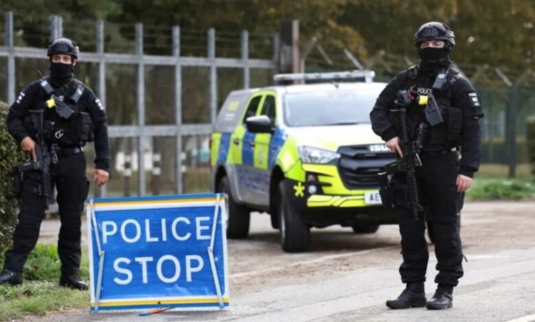 Armed police maintain roadblocks and security checks around RAF Fairford in England