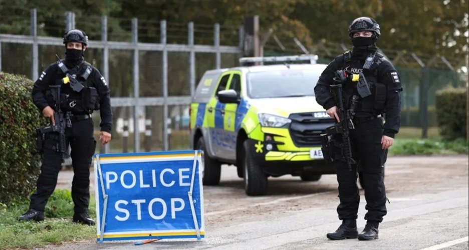 Armed police maintain roadblocks and security checks around RAF Fairford in England