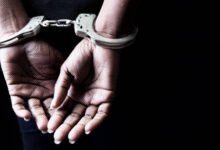 Engraving: Black woman wearing handcuffs. Line art toned image