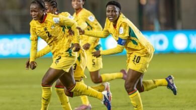 Black Maidens players celebrate the last win against Canada