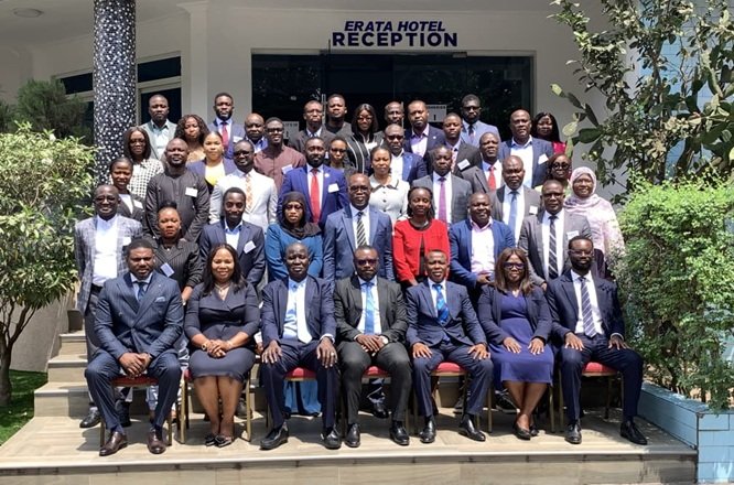 Mr Blay (middle) together with Mr Koora and participants at the event