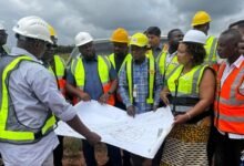 Dr Amoakohene (third from left) and others being briefed at the Boankra Inland Port project site