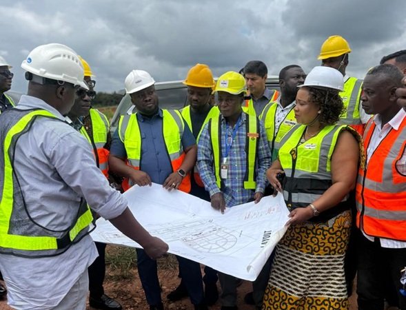 Dr Amoakohene (third from left) and others being briefed at the Boankra Inland Port project site