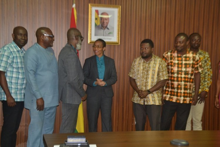 Dr Agyeman-Rawlings (middle) in a chat with Mr Samuel Dampare (third from left) after the event. With them is Dr Tandor (third from right) Photo Victor A. Buxton