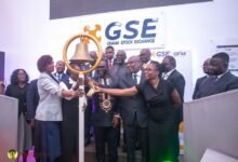 Cocoa Capital Raises----Ms Amoah (third from left) with Dr Abbey (third from right) and others tolling the GSE bell to mark the launch