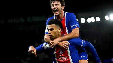 Desire Doue and Joao Neves celebrating the opening goal