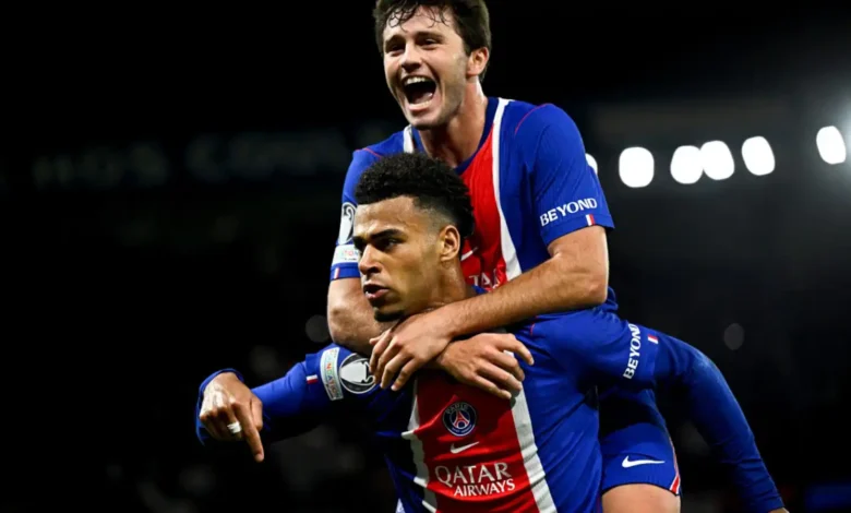 Desire Doue and Joao Neves celebrating the opening goal