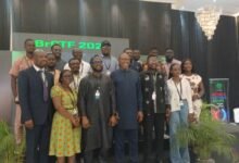 Dr Apaak (fourth from left front raw) with other participants at the programme
