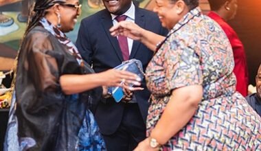 Dr Orleans-Lindsay (middle) interacting with dignitaries at the event