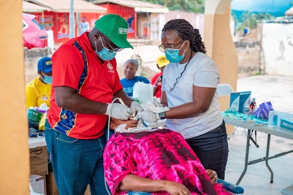 The dental team working on a patient