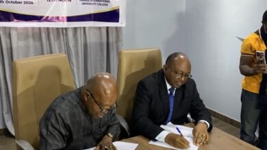 Prof Agyei-Ampomah (left), with Mr Williams (right), signing the MoU