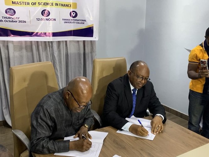 Prof Agyei-Ampomah (left), with Mr Williams (right), signing the MoU