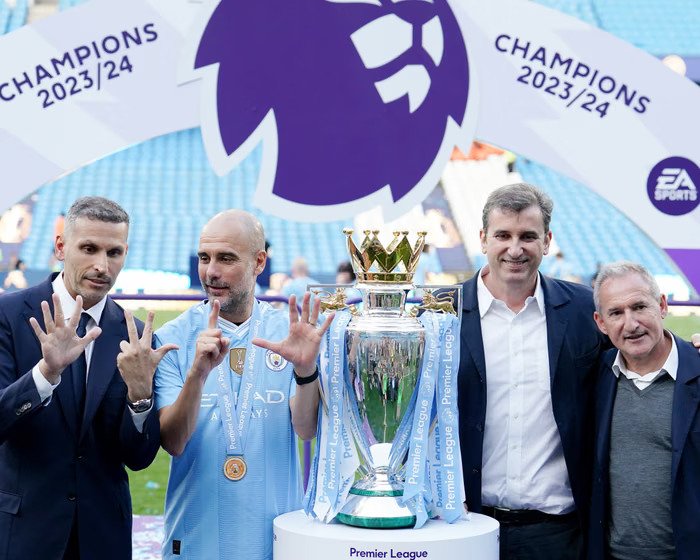 From left to right Khaldoon al-Mubarak, Pep Guardiola, Ferran Soriano and Txiki Begiristain celebrate winning the 2023-24 Premier League