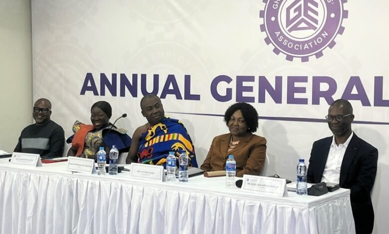 Dr Afriyie (middle) speaking at the programme. With Mrs Ofosu-Adjare (second from left) and other dignitaries at the event