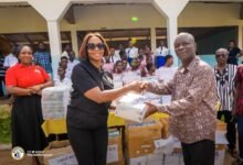Mr John Gyabaah (right) receiving the items