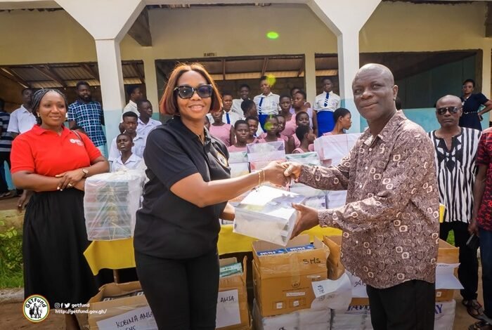 Mr John Gyabaah (right) receiving the items