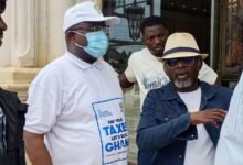 Mr Joseph Annan (left) in talks with Mr Hilaruis MCcash of Jamila Home during the exercise