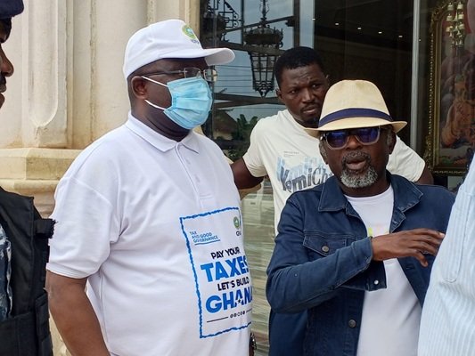 Mr Joseph Annan (left) in talks with Mr Hilaruis MCcash of Jamila Home during the exercise