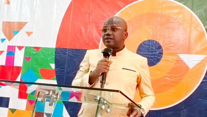 -Prof. Agyei (inset) addressing aparticipants at the event