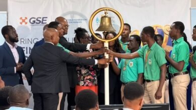 Ms Amoah (fifth from left) with other dignitaries tolling the GSE bell to launch the 2026 Financial Literacy Campaign