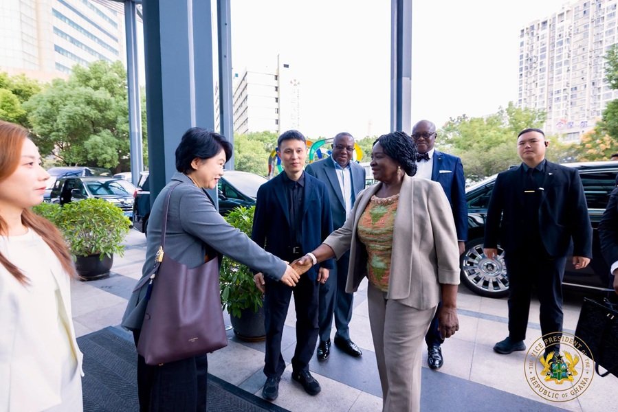 Vice President Prof. Opoku-Agyemang (right) being welcomed by the Shanghai officials during the forum
