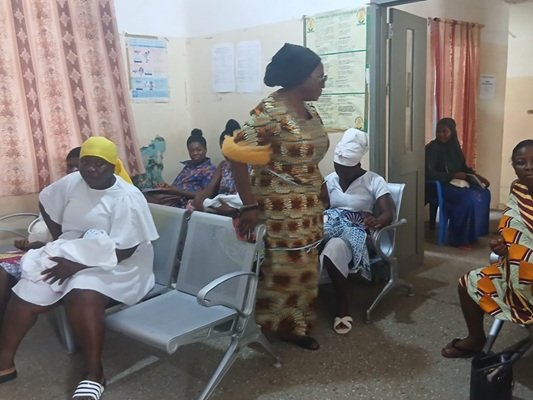 Ms Attrato speaking to the women at the hospital